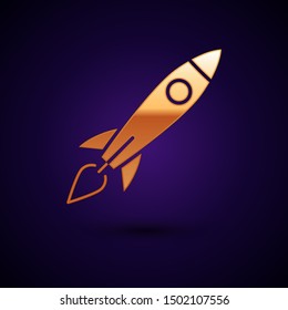 Gold Rocket ship with fire icon isolated on dark blue background. Space travel.  Vector Illustration