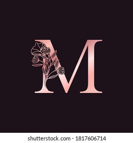 Gold Rose Flower Letter M  Luxury Logo. Elegant alphabet monogram nature floral ornate initial letter vector design.