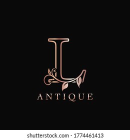 Gold Rose L Luxury Letter Logo Template Design. Monogram antique ornate nature floral leaf with initial letter gold rose color.