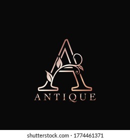 Gold Rose A Luxury Letter Logo Template Design. Monogram antique ornate nature floral leaf with initial letter gold rose color.