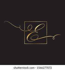 gold script letter e inside square frame