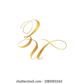 gold script letters Z and U, monogram