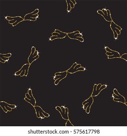 Gold seamless pattern with angel wings. Glittering background. Romantic wallpaper print.