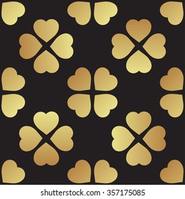 Gold  seamless pattern with clover leaves, the symbol of St. Patrick Day in Ireland. Texture for  wrapping paper, textiles, home decor, skins smartphones 