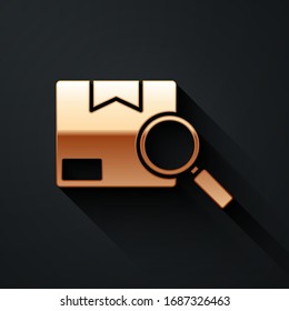 Gold Search package icon isolated on black background. Parcel tracking. Magnifying glass and cardboard box. Logistic and delivery. Long shadow style. Vector Illustration