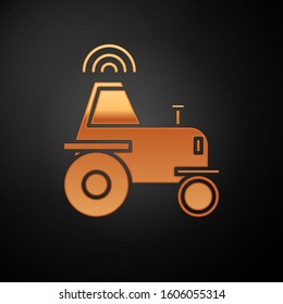 Gold Self driving wireless tractor on a smart farm icon isolated on black background. Smart agriculture implement element.  Vector Illustration