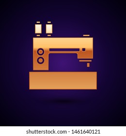 Gold Sewing machine icon isolated on dark blue background.  Vector Illustration