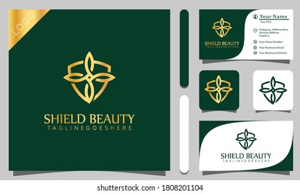 Gold shield beauty lotus luxury logos design vector illustration with line art style vintage, modern company business card template