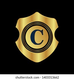 Gold shield with letter C – Vintage luxury logo with the letter C, Can be used for celebrations, anniversaries. Logo for your company. Victory logo for bussines. gold color