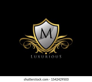 Gold Shield M Letter Logo. Gold Vintage Shield With M Letter prefect for boutique, hotel, restaurant, wedding and other elegant business. 