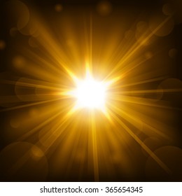 Gold shine with lens flare background