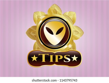  Gold shiny badge with alien icon and Tips text inside