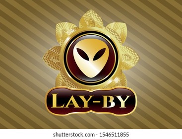  Gold shiny badge with alien icon and Lay-by text inside