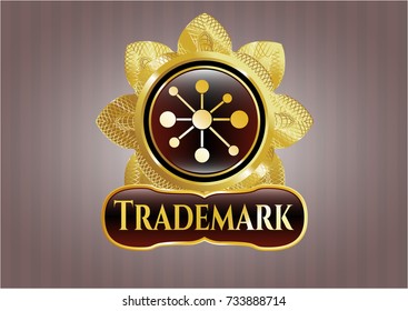  Gold shiny badge with business network icon and Trademark text inside