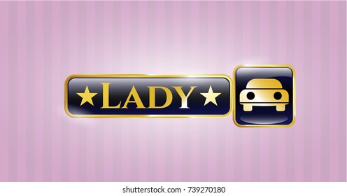  Gold shiny badge with car seen from front icon and Lady text inside