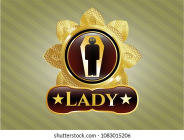   Gold shiny badge with dead man in his coffin icon and Lady text inside