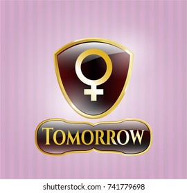  Gold shiny badge with female icon and Tomorrow text inside
