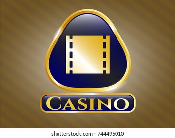  Gold shiny badge with film icon and Casino text inside