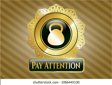   Gold shiny badge with kettlebell icon and Pay Attention text inside