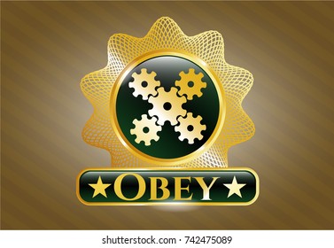  Gold shiny badge with mechanism icon and Obey text inside