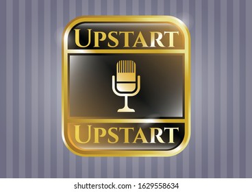  Gold shiny badge with microphone icon and Upstart text inside