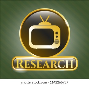  Gold shiny badge with old tv, television icon and Research text inside