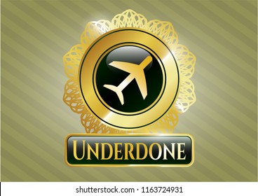  Gold shiny badge with plane icon and Underdone text inside