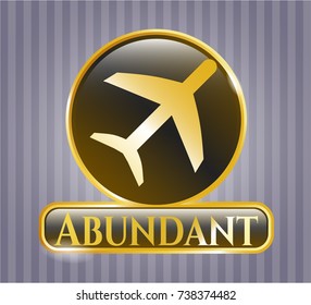  Gold shiny badge with plane icon and Abundant text inside