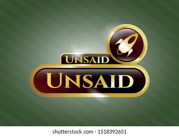  Gold shiny badge with rocket icon and Unsaid text inside