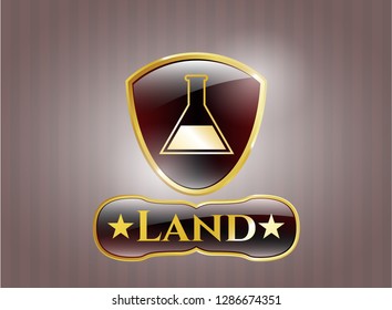  Gold shiny badge with test tube icon and Land text inside
