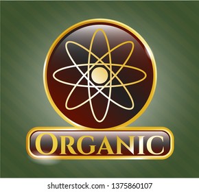  Gold shiny emblem with atom icon and Organic text inside