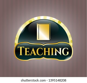  Gold shiny emblem with book icon and Teaching text inside