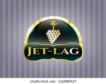  Gold shiny emblem with bunch of grapes icon and Jet-lag text inside