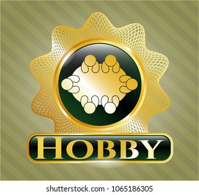   Gold shiny emblem with business meeting teamwork icon and Hobby text inside