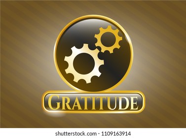  Gold shiny emblem with gear, team work icon and Gratitude text inside