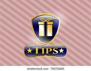  Gold shiny emblem with gift box icon and Tips text inside