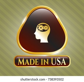  Gold shiny emblem with head with gears inside icon and Made in USA text inside