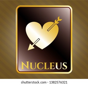 Gold shiny emblem with heart with arrow icon and Nucleus text inside