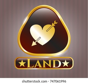  Gold shiny emblem with heart with arrow icon and Land text inside