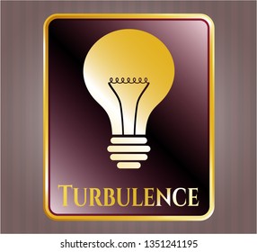  Gold shiny emblem with light bulb icon and Turbulence text inside