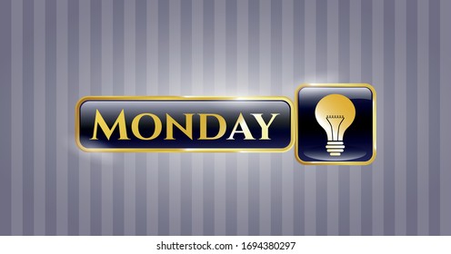  Gold shiny emblem with light bulb icon and Monday text inside