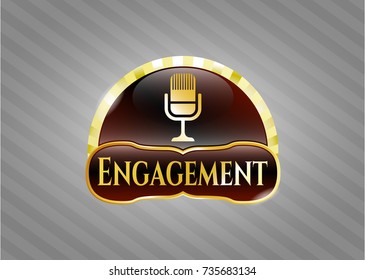  Gold shiny emblem with microphone icon and Engagement text inside