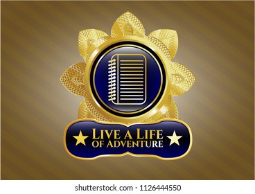  Gold shiny emblem with note book icon and Live a Life of Adventure text inside