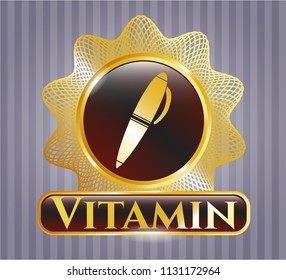  Gold shiny emblem with pen icon and Vitamin text inside