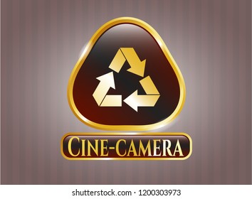  Gold shiny emblem with recycle icon and Cine-camera text inside