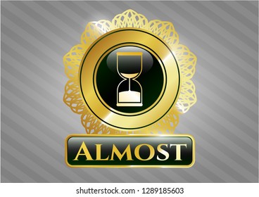  Gold shiny emblem with sand clock icon and Almost text inside