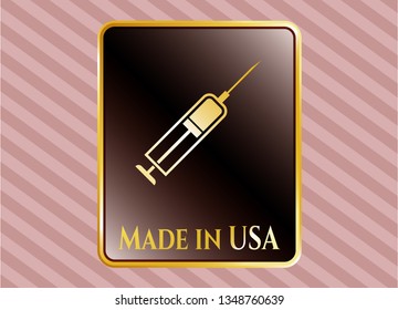  Gold shiny emblem with syringe icon and Made in USA text inside
