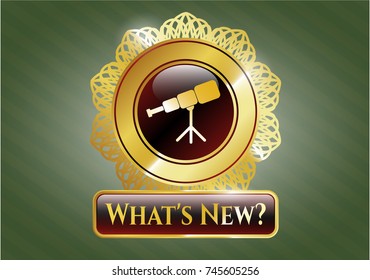  Gold shiny emblem with telescope icon and What's New? text inside