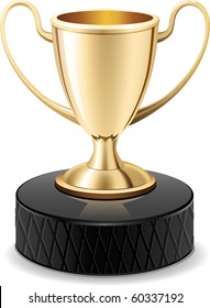 Gold shiny trophy cup award on the top of ice hockey puck