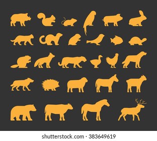 Gold silhouettes set of domestic, farm and wild animals. Icon cow, bear, beaver, sheep, chicken and others.